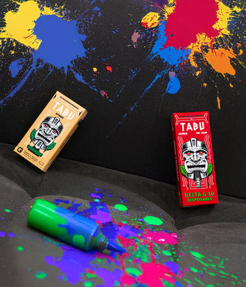 Tabu products on couch with paint splatters