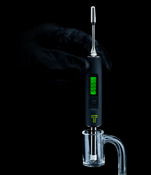 Terpometer being used with banger on black background