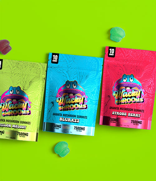 Wacky mushroom gummies 10 packs laying down on green background