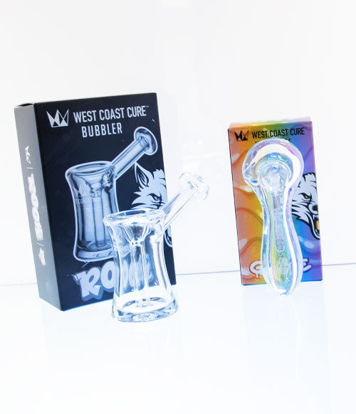 West Coast Cure Products On White Glass Display